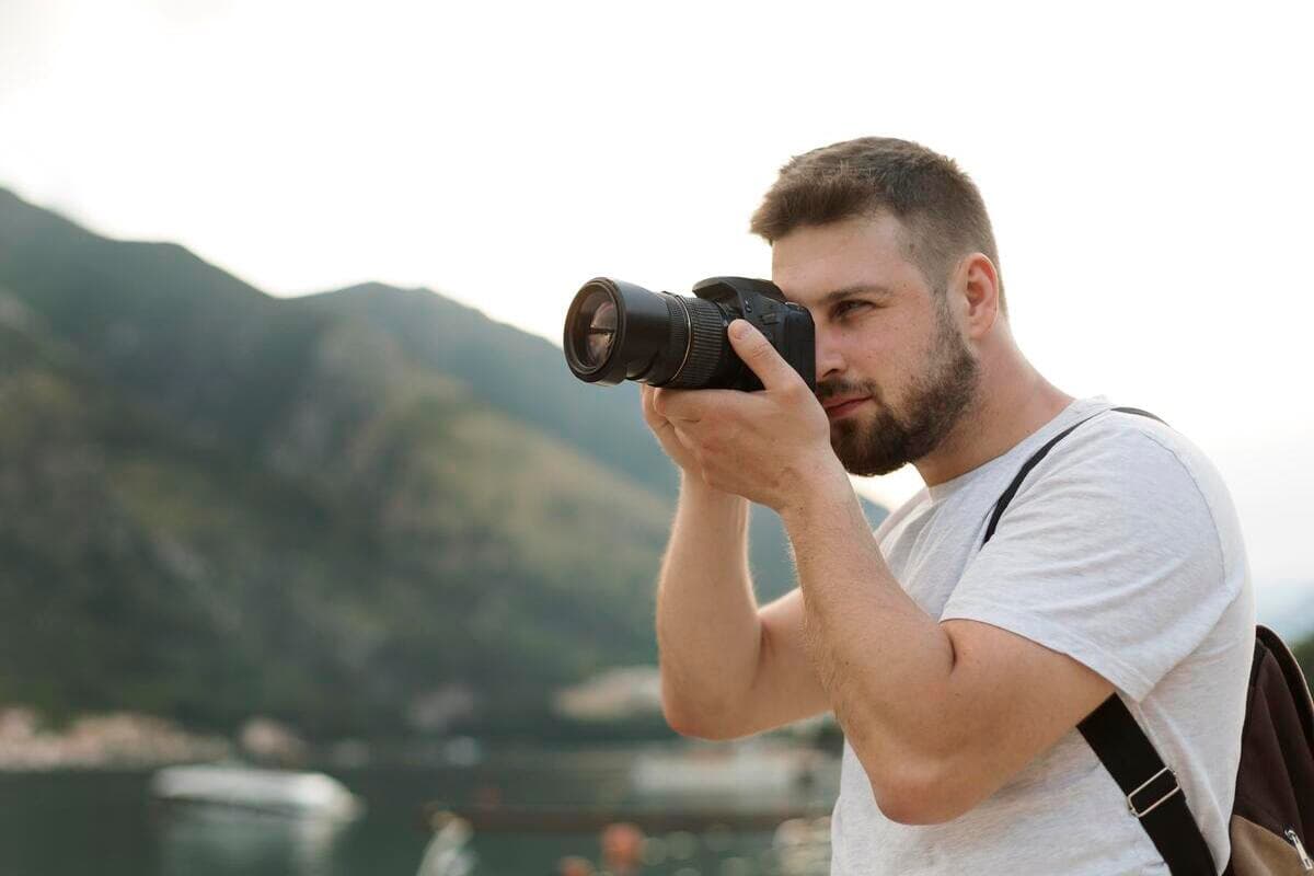 A professional beach photographer taking pictures