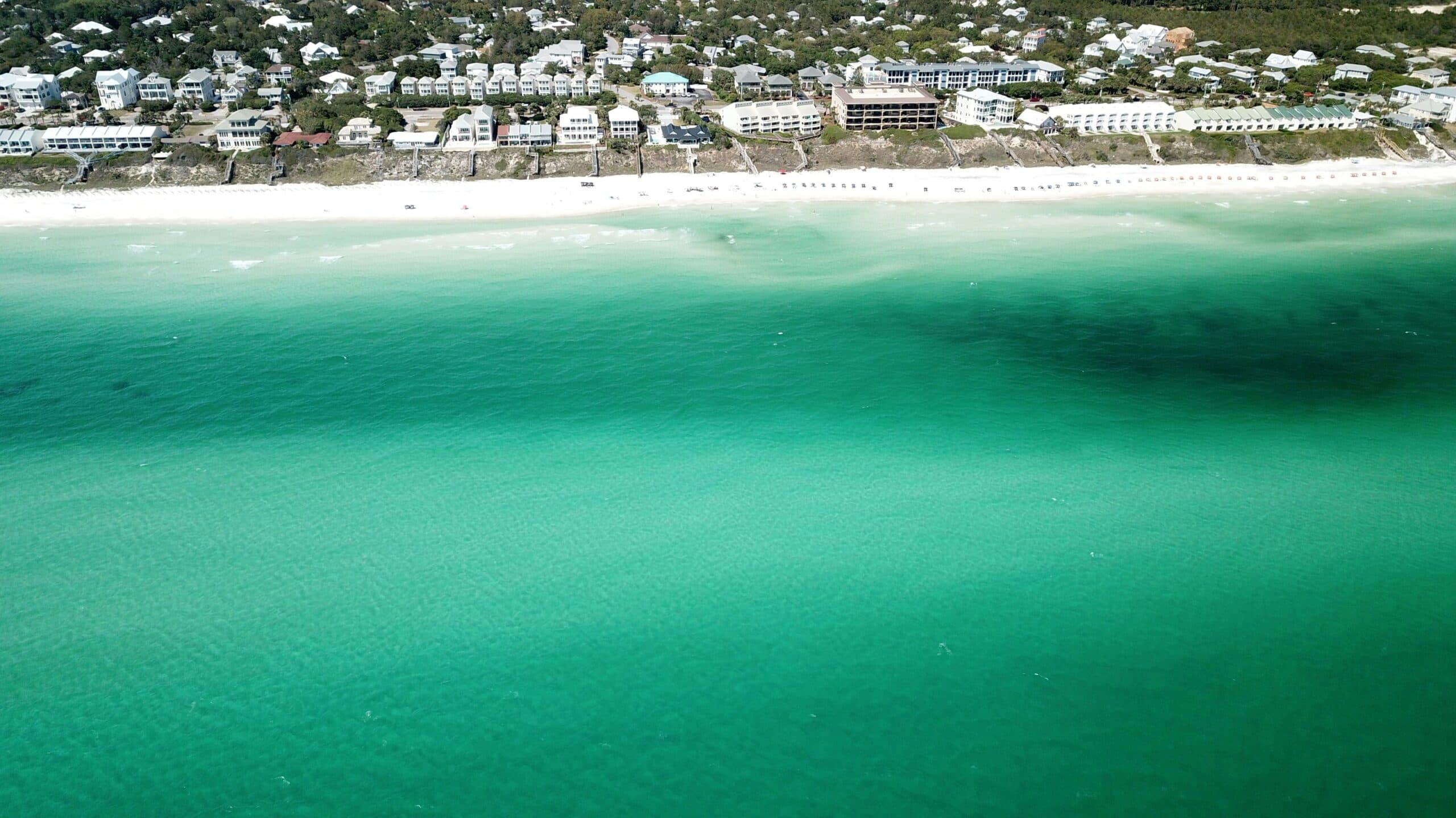 Aerial view of emerald water and beach
